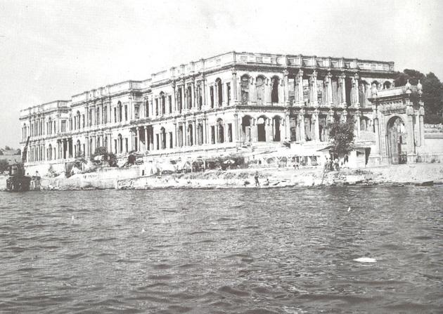 View from the sea of the burnt shell of Ciragan Palace and the main waterront gate, 1976